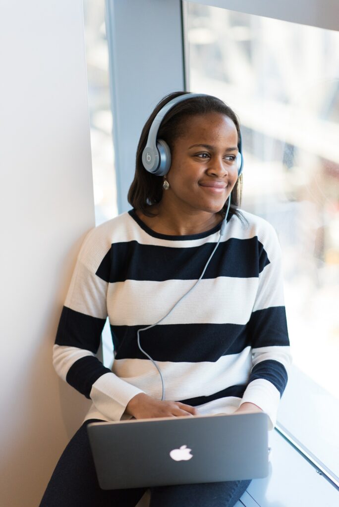 woman listening on headphones